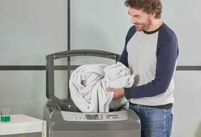 lavadora gris Haceb
